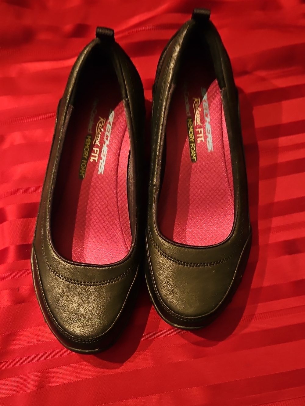 Skechers Black Slip-On Flats with Pink Insole